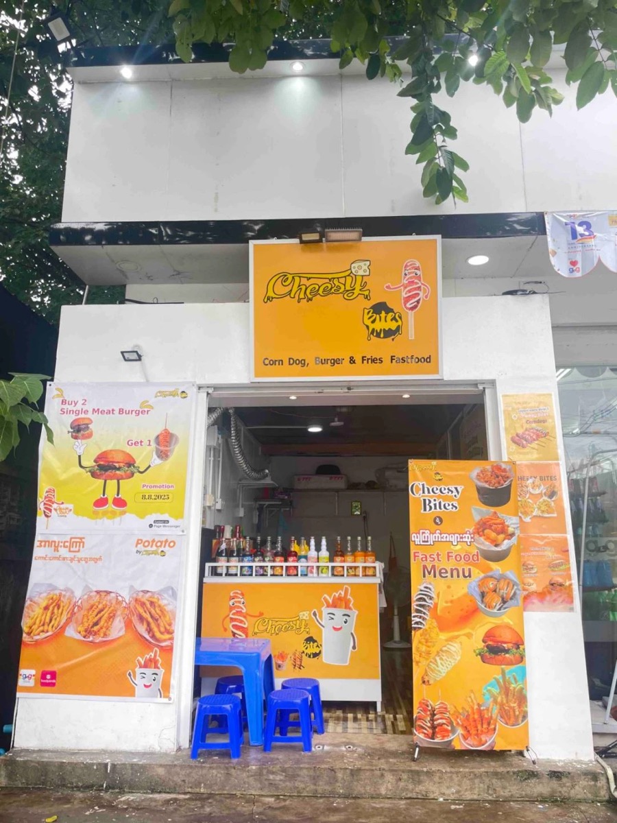 Cheesy Bites franchise outlet with menu banners
